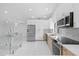Modern kitchen with stainless steel appliances, and ample counter and cabinet space at 15012 Winterwind Dr, Tampa, FL 33624