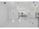Open-concept living space featuring modern finishes and plenty of natural light at 15012 Winterwind Dr, Tampa, FL 33624