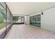 Enclosed patio offering ample space and natural light, perfect for outdoor relaxation at 15012 Winterwind Dr, Tampa, FL 33624