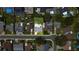 Aerial view of the property showcasing the surrounding neighborhood and tree-lined streets at 1809 Chinaberry Dr, Oldsmar, FL 34677