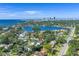 Aerial view of home with surrounding nature and a view of the cityscape at 200 Lamara Ne Way, St Petersburg, FL 33704