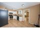 Functional kitchen with tile flooring and an easy transition to other living spaces at 2003 Whispering Pines St, Largo, FL 33774
