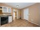 Kitchen with tile floors, granite countertops, and access to additional living spaces at 2003 Whispering Pines St, Largo, FL 33774