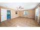 Cozy living room with tile floors and a view to another room at 2003 Whispering Pines St, Largo, FL 33774