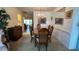 Traditional dining room featuring a chandelier, large table, and classic furnishings at 205 Strong Bow Ct, Sun City Center, FL 33573