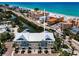 Stunning aerial view of beach condos, featuring boat docks, garages and beach access in Indian Rocks Beach, Florida at 208 Haven Beach Ct, Indian Rocks Beach, FL 33785