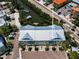 Aerial view showing townhouses near the canal with quick access to the Gulf at 208 Haven Beach Ct, Indian Rocks Beach, FL 33785