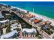 Stunning aerial view showcasing the beautiful coastal condo complex near the beach and intercoastal waters at 208 Haven Beach Ct, Indian Rocks Beach, FL 33785
