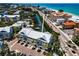 Overhead aerial view of coastal condos in Indian Rocks Beach, Florida, featuring beach access, boat docks and garages at 208 Haven Beach Ct, Indian Rocks Beach, FL 33785