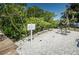 A community amenity sign and fitness equipment area for residents to enjoy the community's facilities at 208 Haven Beach Ct, Indian Rocks Beach, FL 33785
