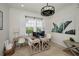 Home office with two desks, modern décor, a ceiling fan, and bright natural light at 208 Haven Beach Ct, Indian Rocks Beach, FL 33785