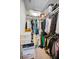 Walk-in closet with shelving and hanging storage, providing ample space for clothing and accessories at 208 Haven Beach Ct, Indian Rocks Beach, FL 33785
