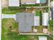 Overhead view of the home's layout with roof, driveway, yards, shed and room for parking at 2818 Lorraine St, Tampa, FL 33614