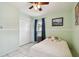 Bedroom features tile floors and a closet, offering ample storage at 2818 Lorraine St, Tampa, FL 33614