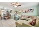 Inviting living room and dining room featuring tile floors and natural light at 2818 Lorraine St, Tampa, FL 33614