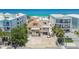 Aerial view showcasing its beachfront location with other buildings nearby at 30 Gulf Blvd, Indian Rocks Beach, FL 33785