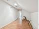Unfinished attic with sloped ceilings, wood floors, and an open doorway at 30 Gulf Blvd, Indian Rocks Beach, FL 33785