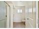 Bright bathroom featuring a glass-enclosed shower and tile flooring at 30 Gulf Blvd, Indian Rocks Beach, FL 33785
