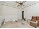 Bright bedroom featuring neutral decor and a ceiling fan at 30 Gulf Blvd, Indian Rocks Beach, FL 33785