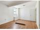 This bedroom has hardwood floors, a window for natural light, and easy access to other rooms at 30 Gulf Blvd, Indian Rocks Beach, FL 33785