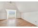 A bedroom with a window and ceiling fan, as well as light wood flooring at 30 Gulf Blvd, Indian Rocks Beach, FL 33785