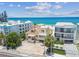 Aerial view of house shows close proximity to the beach at 30 Gulf Blvd, Indian Rocks Beach, FL 33785