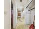 Hallway with damaged walls and flooring, showing signs of wear and tear at 30 Gulf Blvd, Indian Rocks Beach, FL 33785