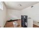 Kitchen with wood floors, white walls, and appliances at 30 Gulf Blvd, Indian Rocks Beach, FL 33785