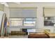 Bright, airy living space showcasing natural light through the window, complemented by neat window shades and classic design at 30 Gulf Blvd, Indian Rocks Beach, FL 33785