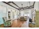 Bright living room with hardwood floors, fireplace, and windows with natural light at 30 Gulf Blvd, Indian Rocks Beach, FL 33785