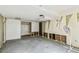 Spacious living area ready to be renovated with closet space and ceiling texture at 30 Gulf Blvd, Indian Rocks Beach, FL 33785