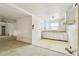 Open concept living and dining area featuring ample natural light and renovation potential at 30 Gulf Blvd, Indian Rocks Beach, FL 33785