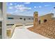 A rooftop view showcases the surrounding buildings and a bright blue sky with fluffy white clouds at 30 Gulf Blvd, Indian Rocks Beach, FL 33785