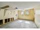 Shows a room with dated wallpaper, exposed framing, and an outdated fan at 30 Gulf Blvd, Indian Rocks Beach, FL 33785