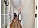 Inviting entryway featuring wood-look flooring and views into the living area at 310 S Willow Ave # A, Tampa, FL 33606