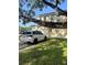 Inviting exterior of a home with a well-maintained lawn and a spacious driveway at 310 S Willow Ave # A, Tampa, FL 33606
