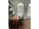 Home office with a modern desk, shelves, and natural light from large windows at 310 S Willow Ave # A, Tampa, FL 33606
