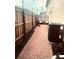 Private brick patio with a wood fence and outdoor seating offering a cozy retreat at 310 S Willow Ave # A, Tampa, FL 33606