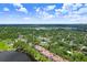 Aerial shot of condo overlooking a scenic lake and surrounding area at 3145 Lake Ellen Dr # 3145, Tampa, FL 33618