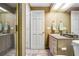 Bathroom features a walk-in shower, marble floors, and a vanity with storage space at 3145 Lake Ellen Dr # 3145, Tampa, FL 33618