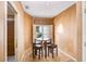 Cozy breakfast nook featuring neutral walls, recessed lighting, plantation shutters, and a glass table with 4 upholstered stools at 3145 Lake Ellen Dr # 3145, Tampa, FL 33618