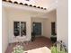 Inviting courtyard featuring seating, table, and a double door entrance at 3145 Lake Ellen Dr # 3145, Tampa, FL 33618