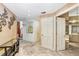 Hallway with elegant marble floors leading to rooms with bright lighting at 3145 Lake Ellen Dr # 3145, Tampa, FL 33618