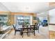 Bright and spacious kitchen with stainless steel appliances and large island overlooking the dining area at 3145 Lake Ellen Dr # 3145, Tampa, FL 33618