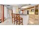 Spacious kitchen with granite countertops, kitchen island, breakfast bar and stainless appliances at 3145 Lake Ellen Dr # 3145, Tampa, FL 33618