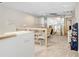 Open-concept living area with neutral decor and staircase access at 3145 Lake Ellen Dr # 3145, Tampa, FL 33618