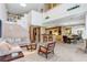 Large open-concept living space with views of the kitchen, dining, and second-floor landing at 3145 Lake Ellen Dr # 3145, Tampa, FL 33618