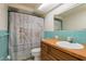 Bathroom featuring vanity, toilet and unique shower curtain at 3547 Morley Dr, New Port Richey, FL 34652
