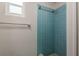 A blue tile shower stall at 3547 Morley Dr, New Port Richey, FL 34652
