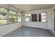 Enclosed sun room featuring large windows offering plenty of natural light at 3547 Morley Dr, New Port Richey, FL 34652